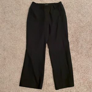 Black dress pants, mild flare, curvy fit.